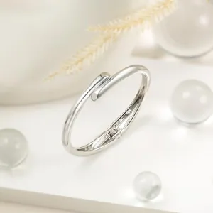 Open Bangle, gold-plated steel, silver, another view